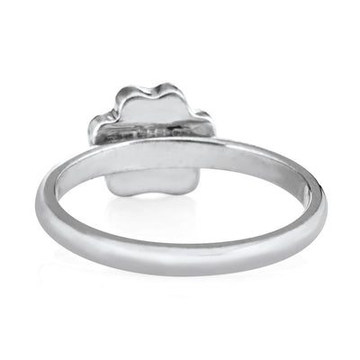 Pictured here is the 14K White Gold Paw Print Stacking Cremation Ring by close by me jewelry from the back to show the inside of the band and back of the setting