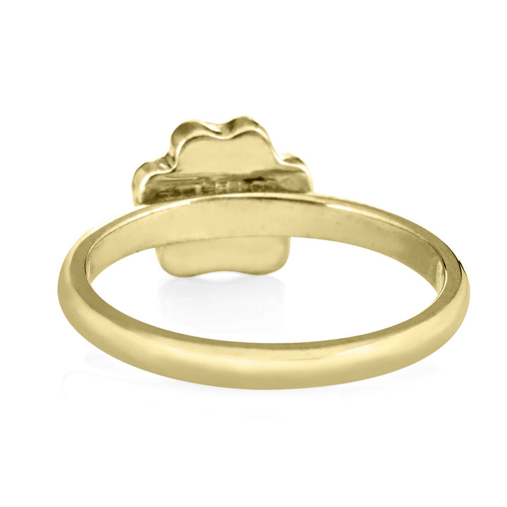 Pictured here is close by me jewelry's 14K Yellow Gold Paw Print Stacking Ring design from the back to show the back of the setting and inside of the band