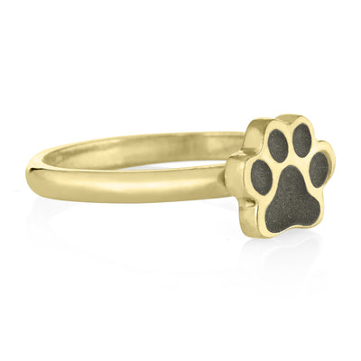 Pictured here is close by me jewelry's 14K Yellow Gold Paw Print Stacking Ring design from the side to show the thickness of the bezel and band