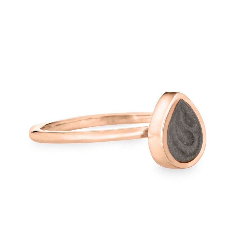 Pictured here is close by me jewelry's Pear Stacking Cremation Ring in 14K Rose Gold from the side