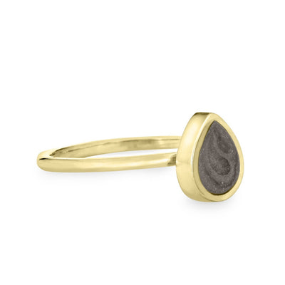 Pictured here is the 14K Yellow Gold Pear Stacking Cremation Ring by close by me jewelry from the side