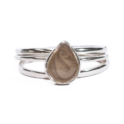 This photo shows the Sterling Silver Pear Cremated Remains Stacking Ring Set designed by close by me jewelry from the front