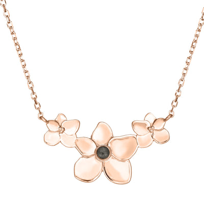 This photo shows the 14K Rose Gold Hydrangea Cluster Pendant with ashes designed by close by me jewelry from the front