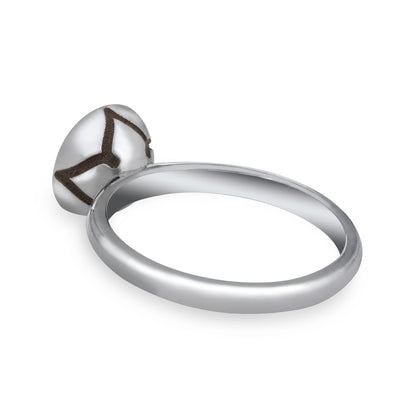 This photo shows the Signature Lotus Stackable Band Cremation Ring in 14K White Gold, designed by close by me jewelry, from the back at an angle