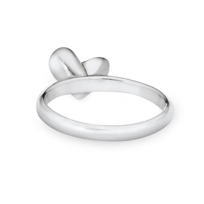 This photo shows the Signature Heart Stackable Band Ashes Ring designed by close by me jewelry in 14K White Gold from the back