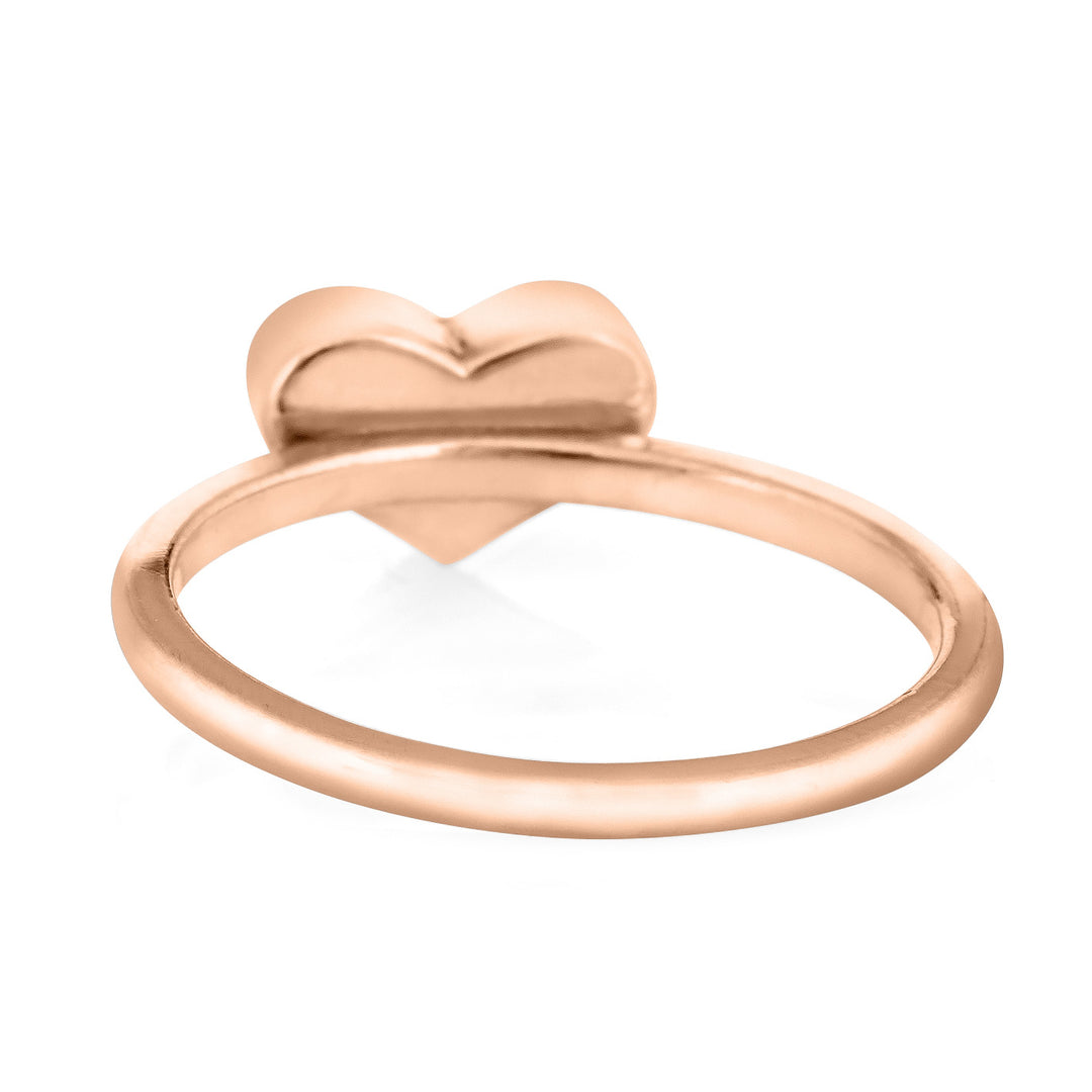 Pictured here is the 14K Rose Gold Small Heart Stacking Ring with ashes designed by close by me jewelry from the back