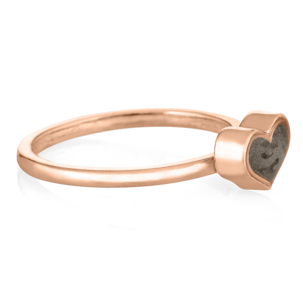 Pictured here is the 14K Rose Gold Small Heart Stacking Ring with ashes designed by close by me jewelry from the side