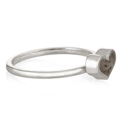 Pictured here is the Small Heart Stacking Ashes Ring designed by close by me jewelry in Sterling Silver from the side