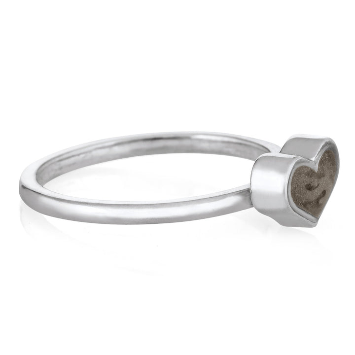 This photo shows close by me jewelry's 14K White Gold Small Heart Stacking Cremains Ring design from the side