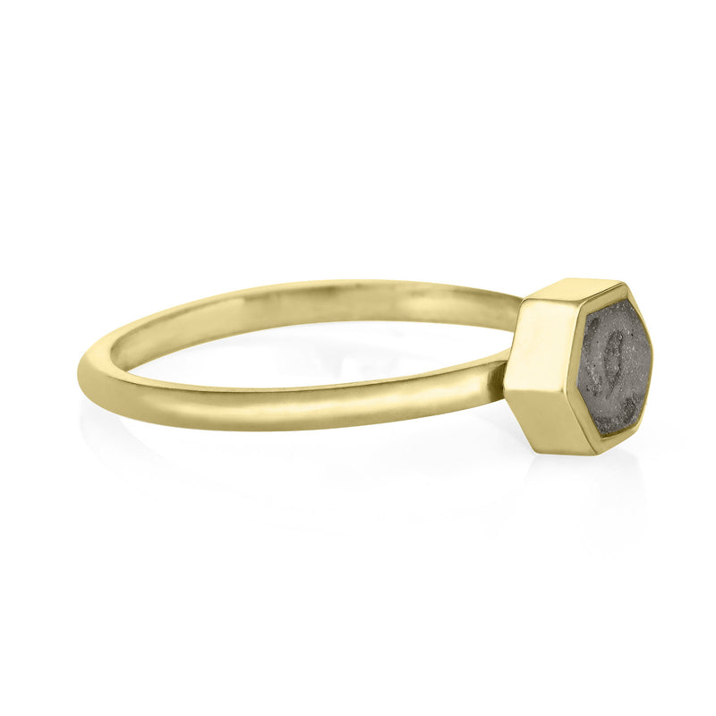 This photo shows the 14K Yellow Gold Small Hexagon Stacking Ring with cremains by close by me jewelry from the side