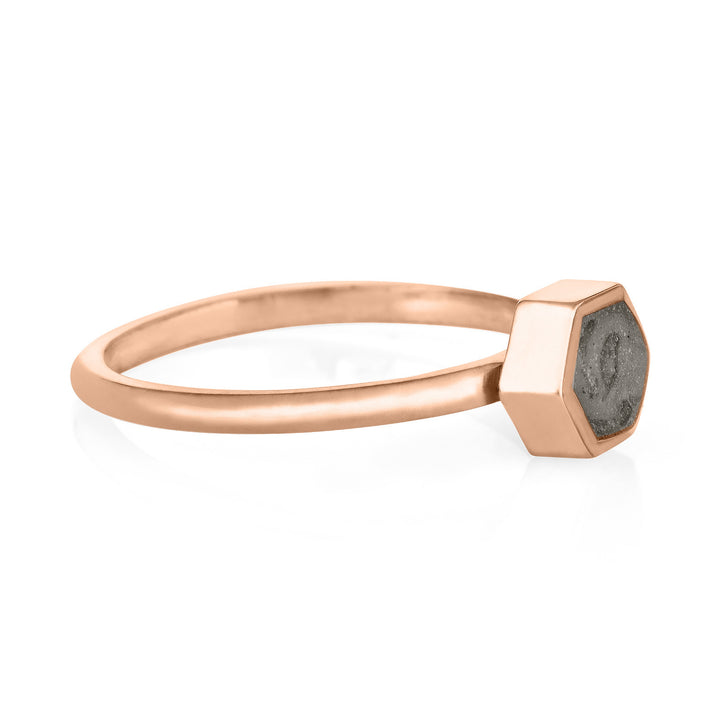 This photo shows the Small Hexagonal Ashes Stacking Ring designed by close by me jewelry in 14K Rose Gold from the side