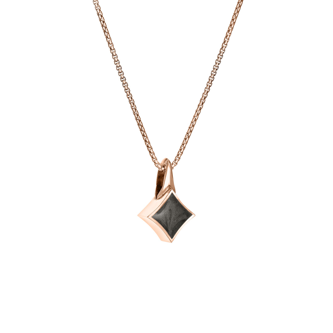 Pictured here is close by me jewelry's 14K Rose Gold Small Luminary Pendant with ashes design from the side