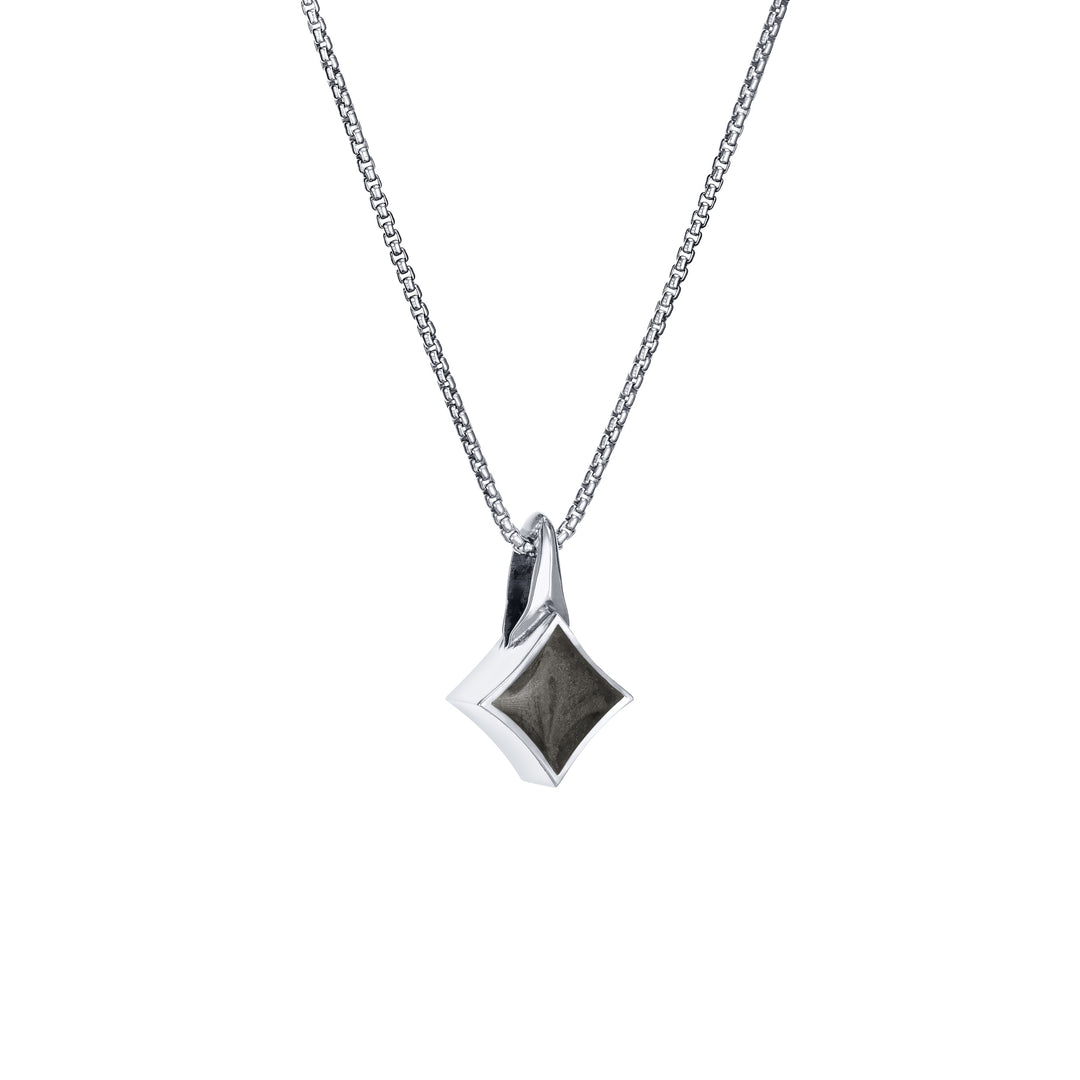 This photo shows the Small Luminary Pendant design with ashes in 14K White Gold by close by me jewelry from the side