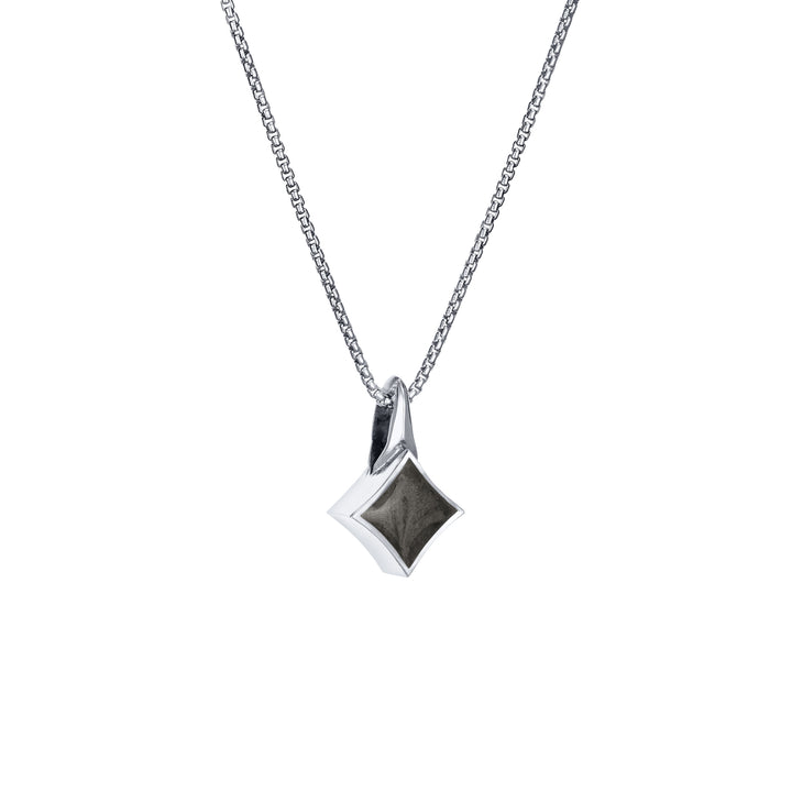 This photo shows the Small Luminary Pendant design with ashes in 14K White Gold by close by me jewelry from the side