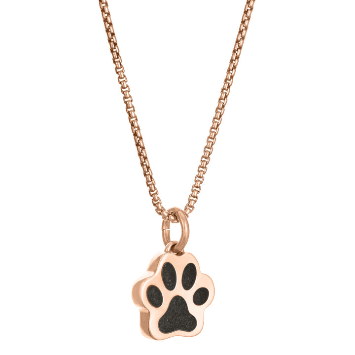 This photo shows the 14K Rose Gold Small Paw Print Necklace with ashes design by close by me jewelry from the side