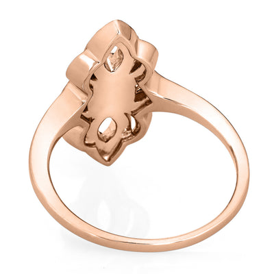 Close-up view of the inside of Close By Me Jewelry's vintage-style World War II Cremation Ring in 14K Rose Gold with Champagne Diamonds, set against a solid white background. The oval bezel in the center (not shown) contains solidified cremated remains.
