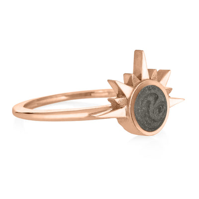 This photo shows close by me jewelry's 14K Rose Gold Sunrise Ring with cremains from the side
