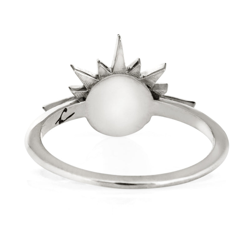This photo shows the Sterling Silver Sunrise Ring with ashes, designed by close by me jewelry, from the back