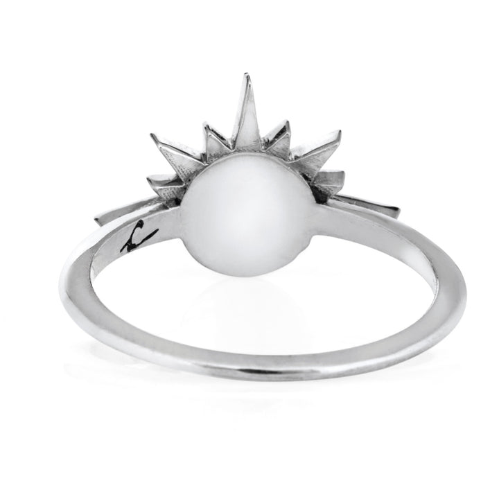 This photo shows the Sunrise Cremation Ring designed by close by me jewelry in 14K White Gold from the back