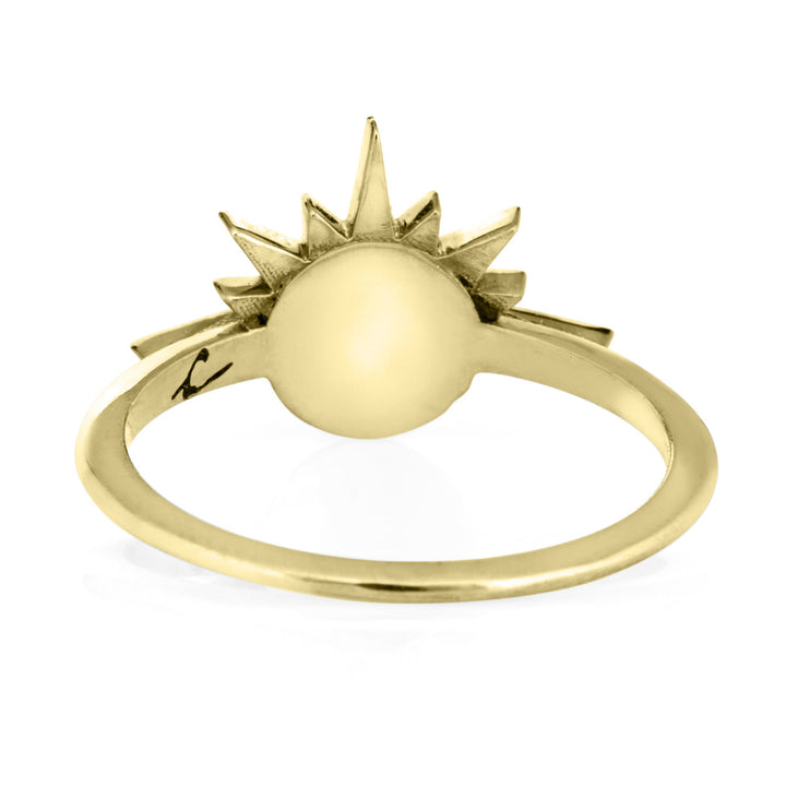 Pictured here is the Sunrise Cremated Remains Ring designed by close by me jewelry in 14K Yellow Gold from the back