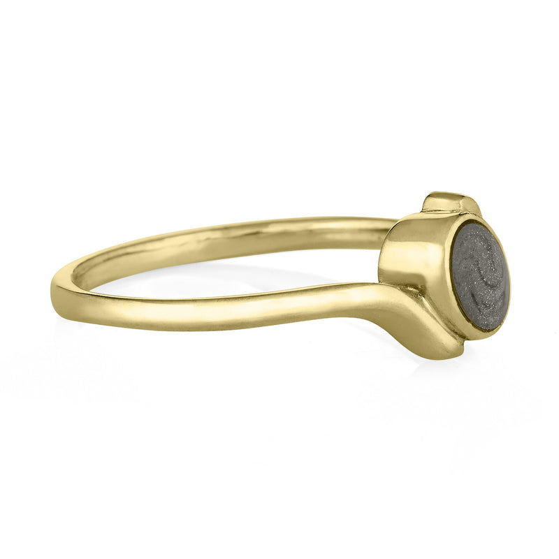 This photo shows the Tilted Oval Ring with Cremated Remains in 14K Yellow Gold, designed by close by me jewelry, from the side