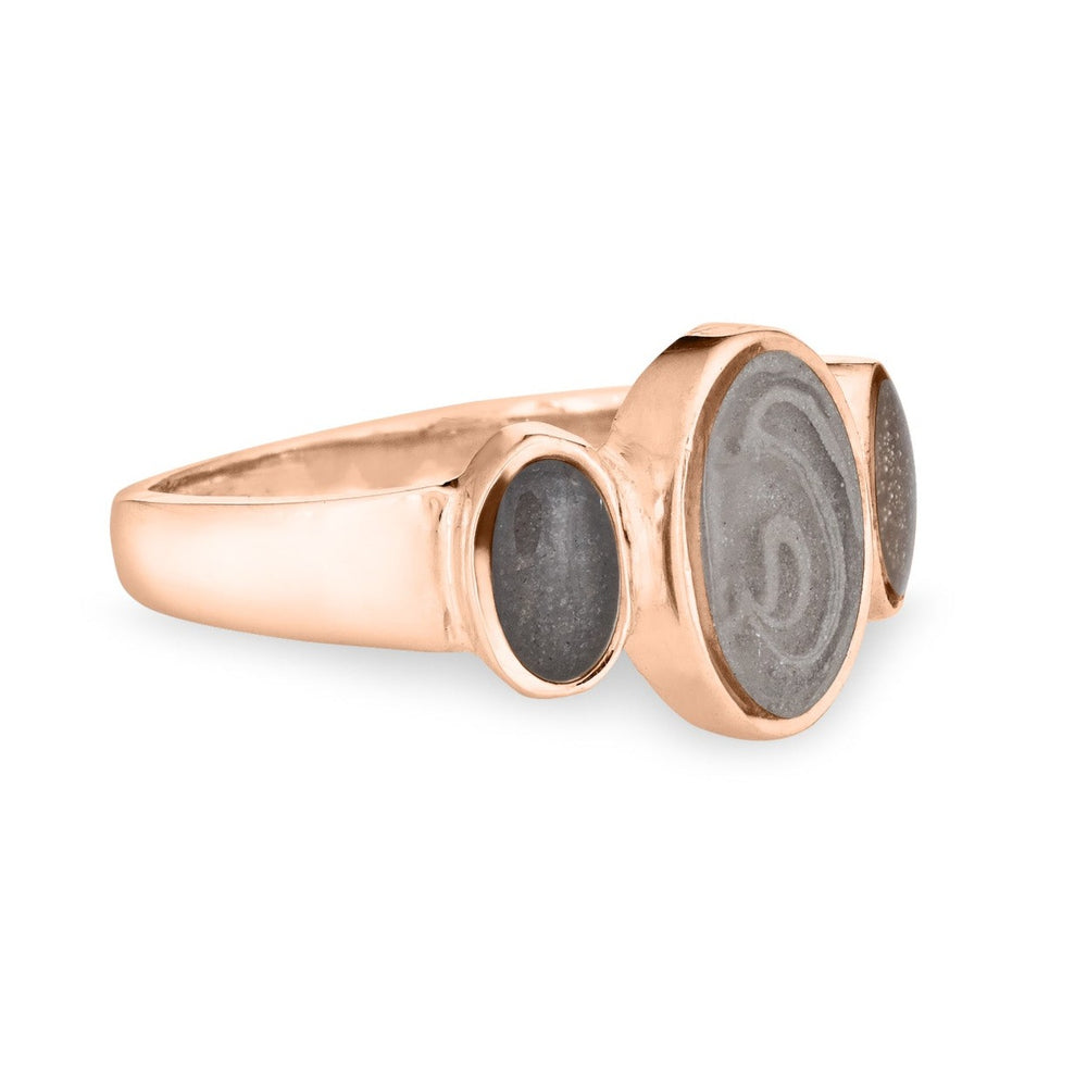 This photo shows close by me jewelry's 14K Rose Gold Triple Oval Cremation Ring design from the side