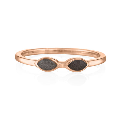 This photo shows the 14K Rose Gold Two Setting Ashes Ring design by close by me jewelry from the front to show its light and dark grey ashes settings