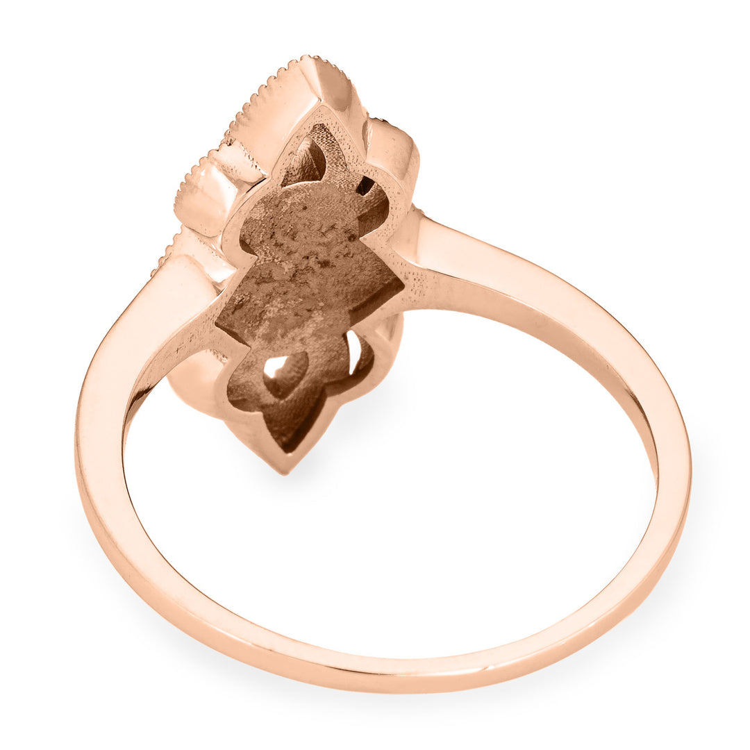 Pictured here is a close-up back view of Close By Me Jewelry's vintage-style WWII Cremation Ring in 14K Rose Gold, featuring a large oval bezel (not shown) containing solidified ashes.