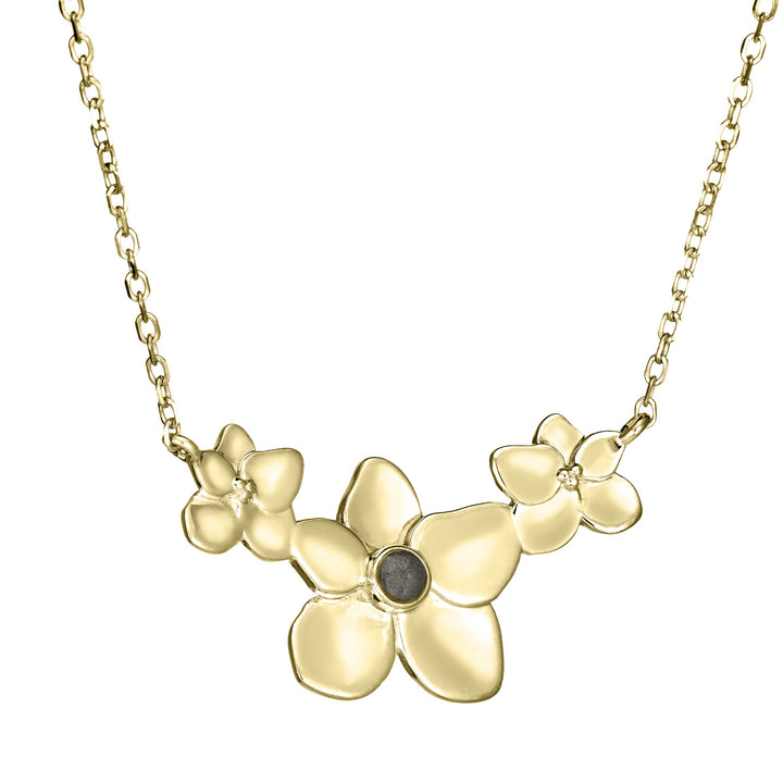 This photo shows the 14K Yellow Gold Hydrangea Cluster Flower Ashes Necklace designed by close by me jewelry at a slight angle